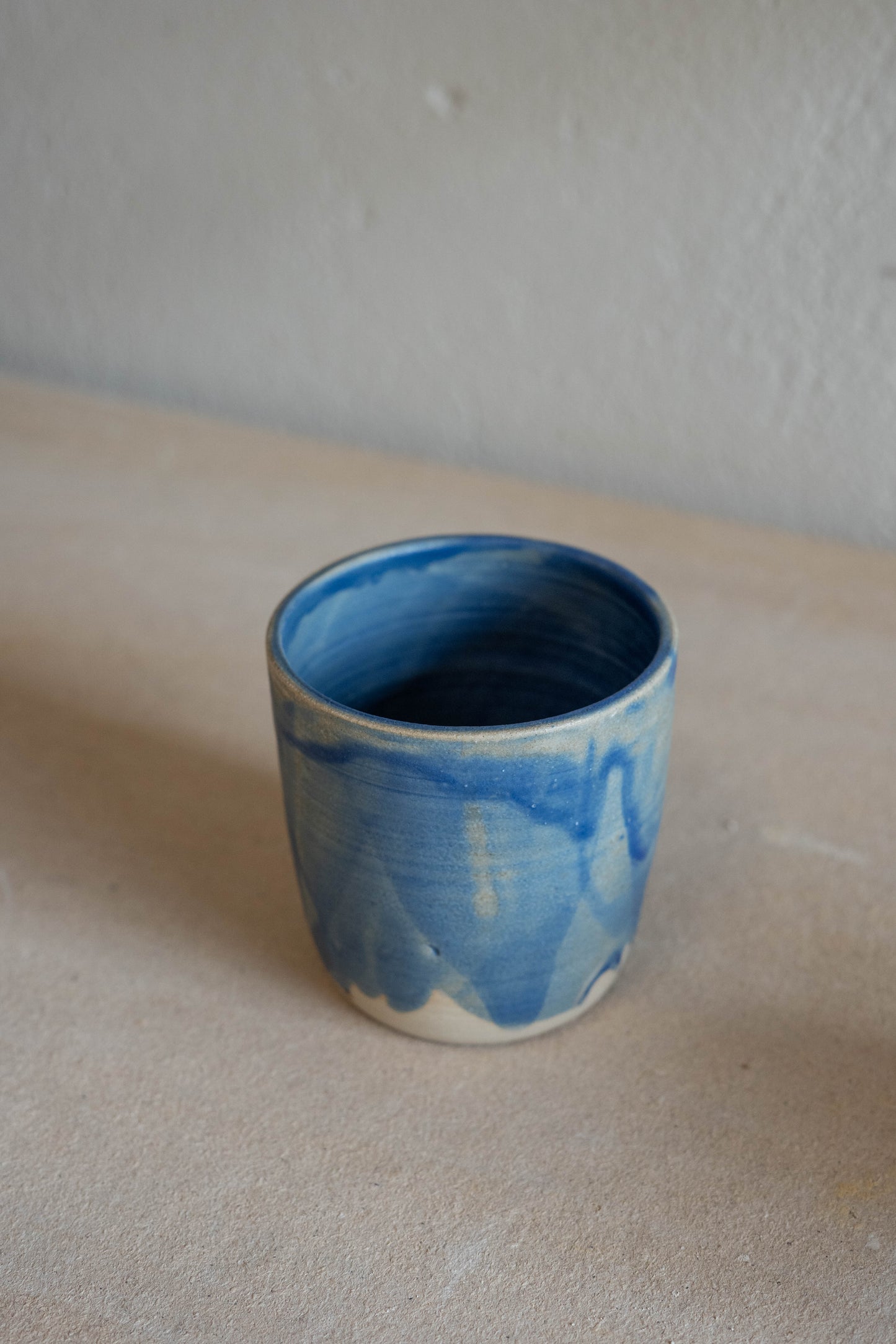 Small blue cup