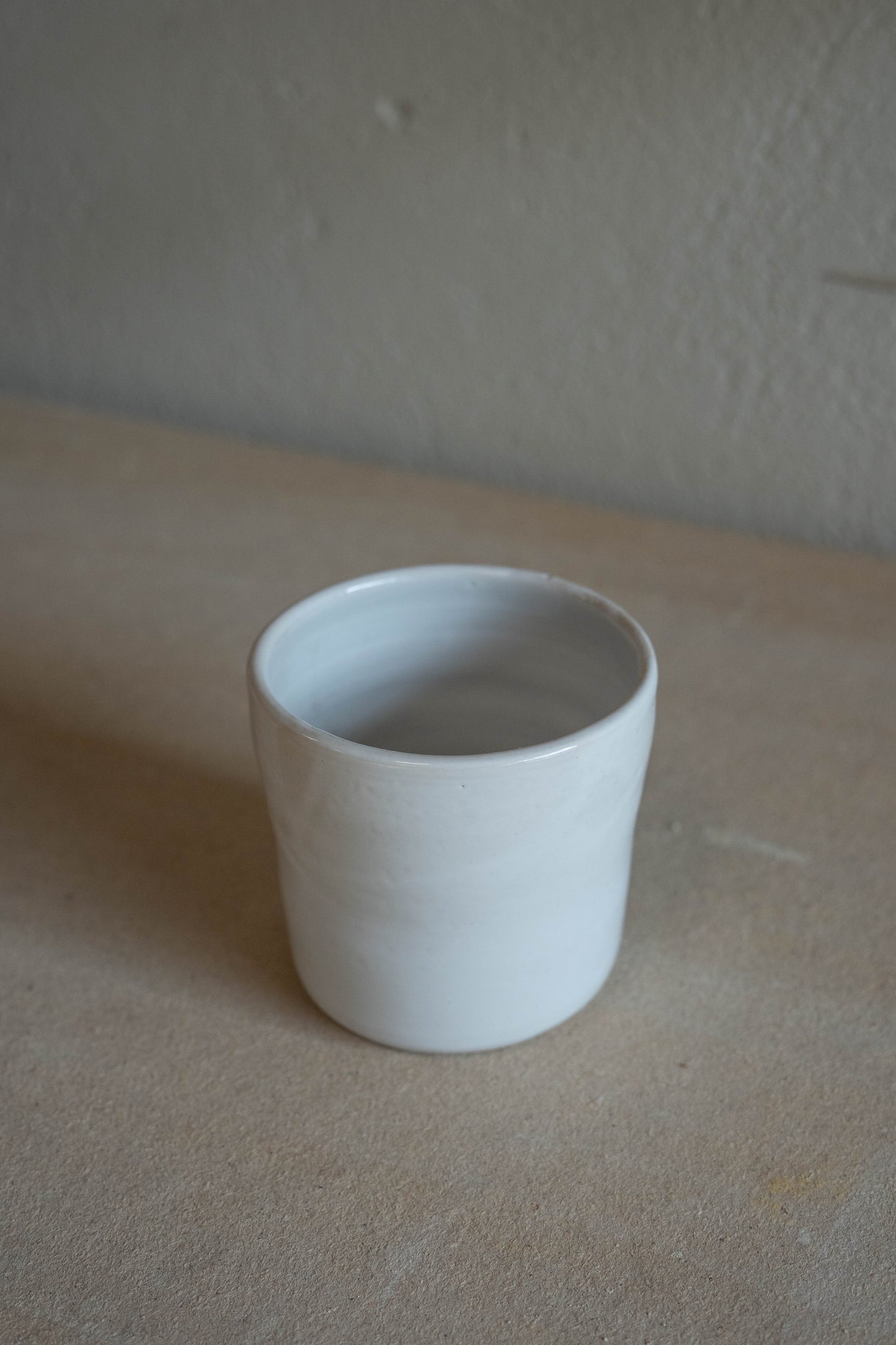 Small white cup