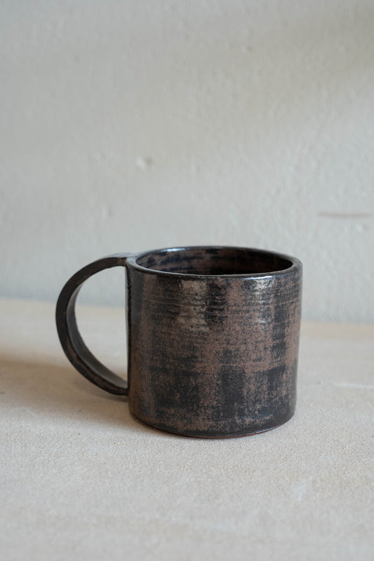 Dark red-black mug with handle