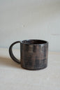 Dark red-black mug with handle