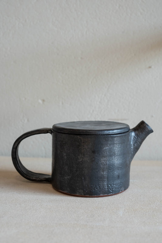 Small black teapot