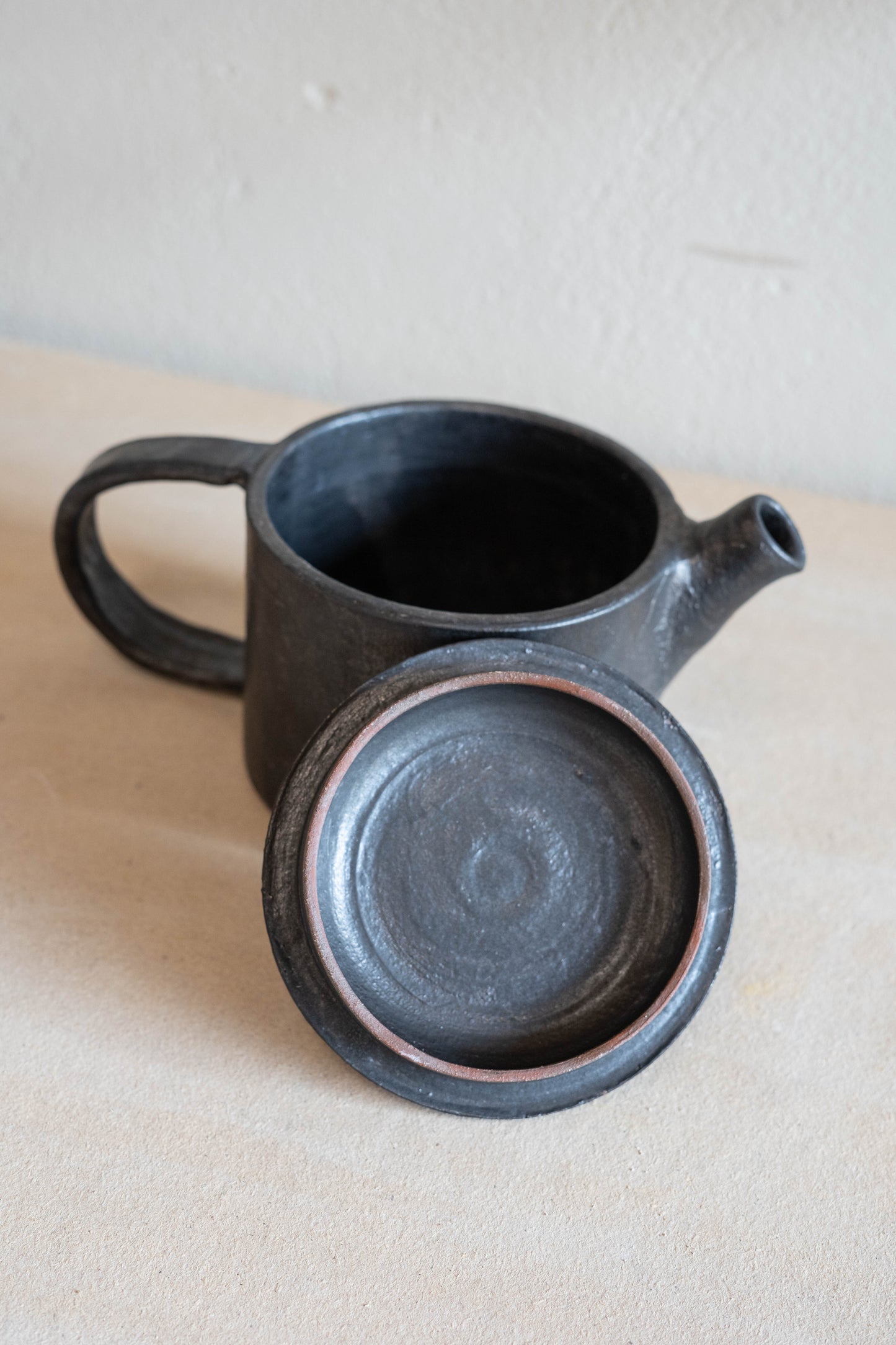 Small black teapot
