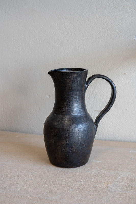 Large black jug