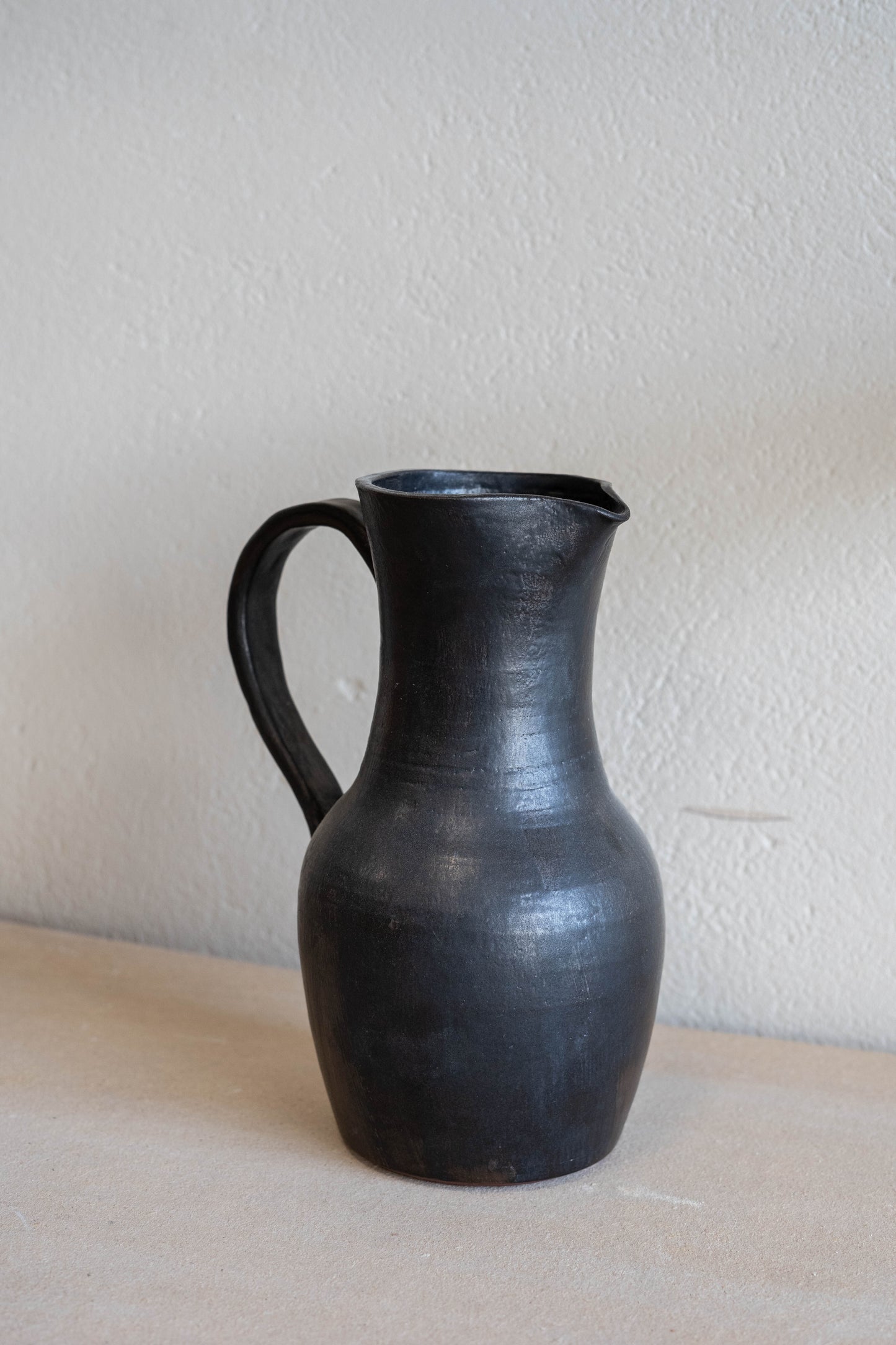 Large black jug
