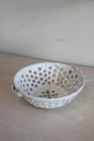 Colander in Snow